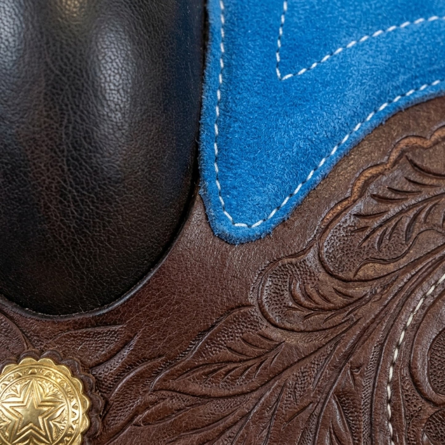 Leather Youth Western Saddle | 12" Blue Seat – Tooled with Gold Conchos — close-up of the surface texture