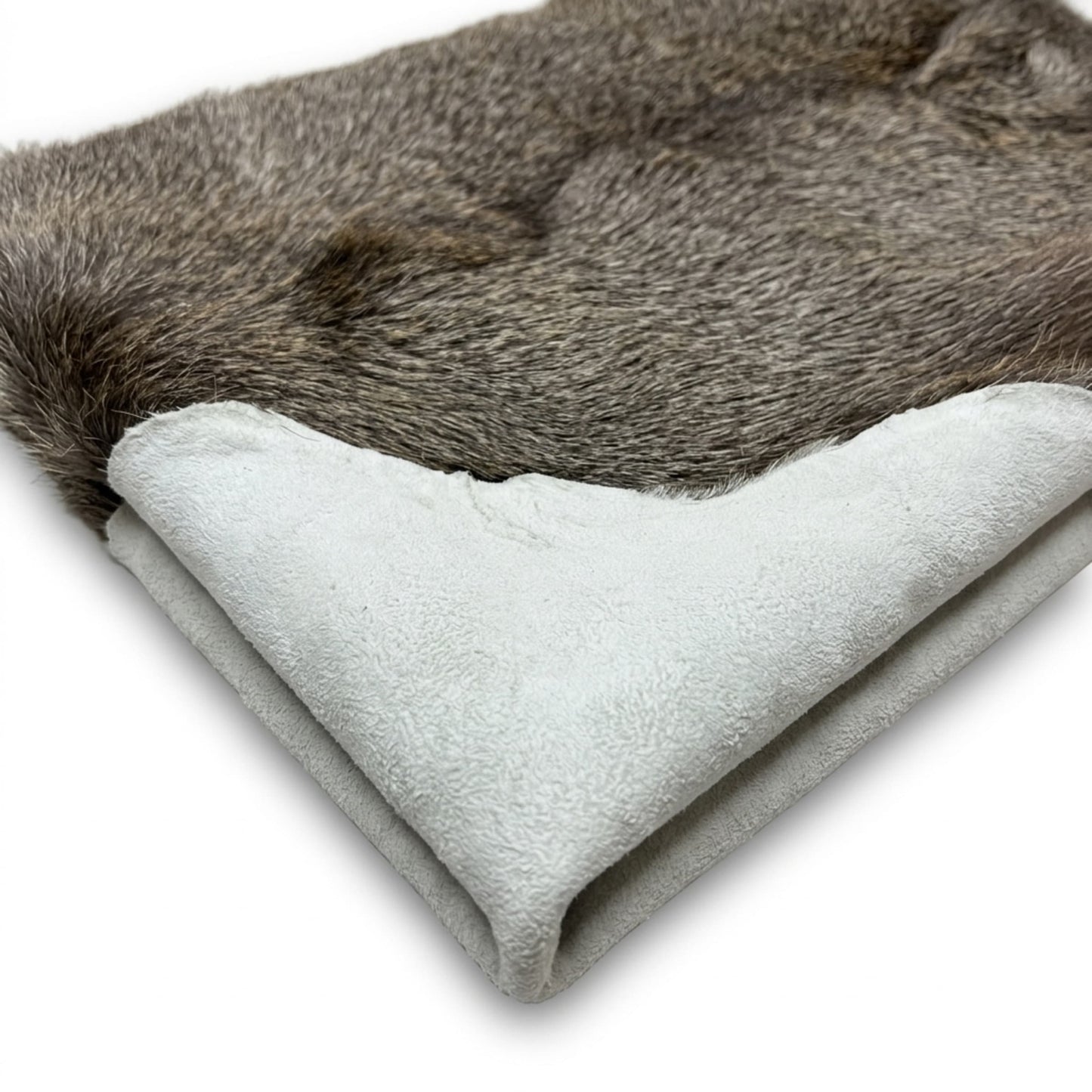 Elk Hide Rug | Icelandic Hair-On – Natural 4.5 x 3.5 Ft — three-quarter angle view on white