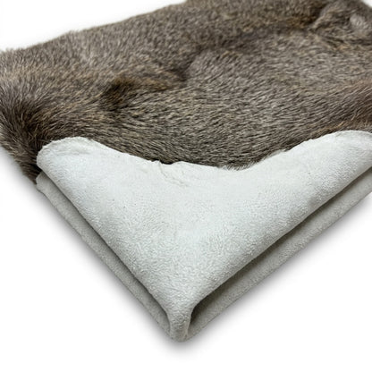 Elk Hide Rug | Icelandic Hair-On – Natural 4.5 x 3.5 Ft — three-quarter angle view on white