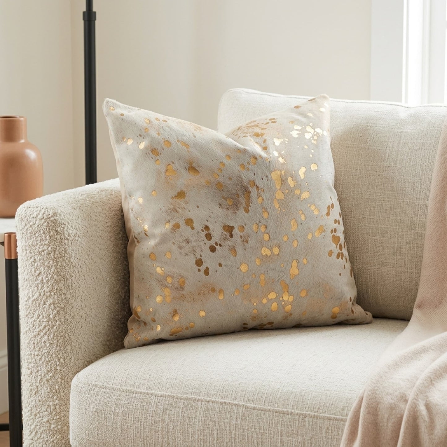 Cowhide Pillow Cover | Metallic Gold & Beige – Hair-On 20x20 — 02 on sofa