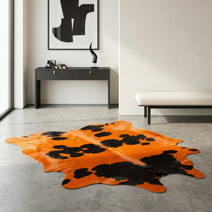 Cowhide Brazilian Rug | Orange and Black Dyed Hair-On – 7.5x6.5 Ft Statement styled in a contemporary home setting