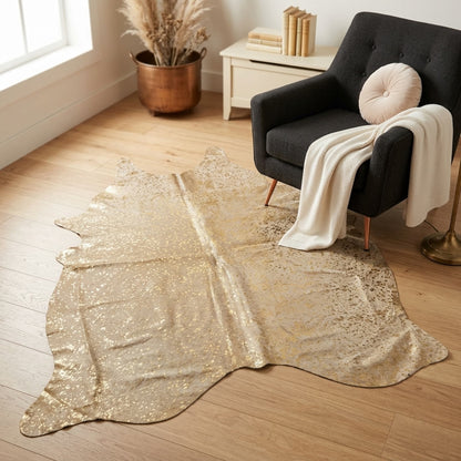 Cowhide Hair-On Rug | Colombian Metallic Gold Acid Wash Large — size reference next to furniture