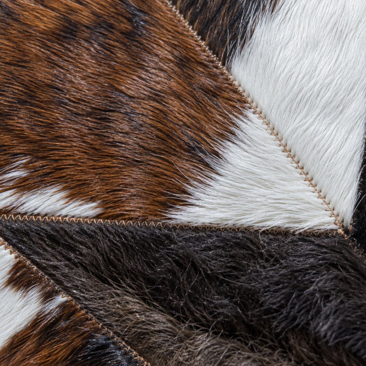 Cowhide Christmas Tree Skirt | Tricolor – 3.5 & 5 Ft — close-up of the surface texture