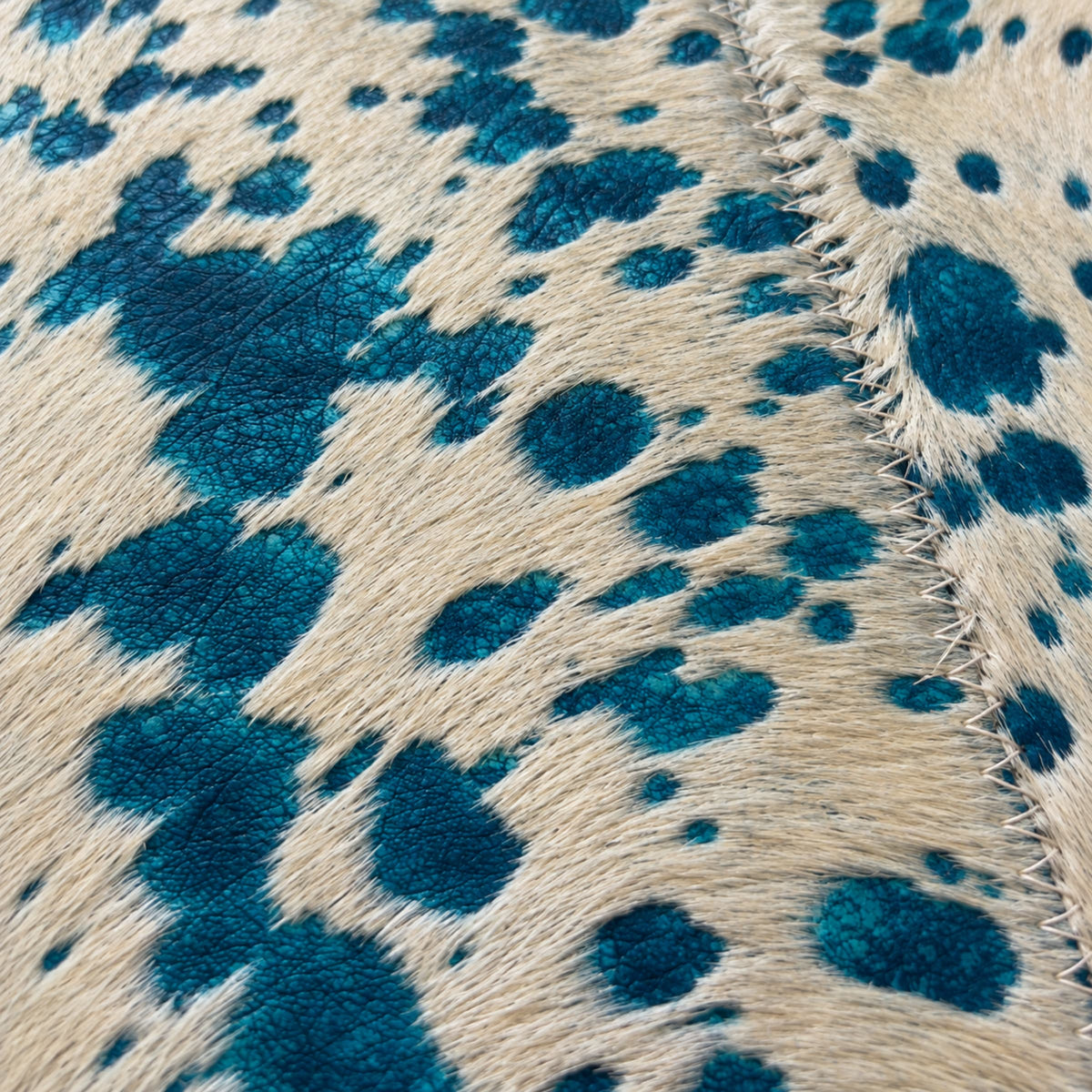 Cowhide Table Runner | White with Turquoise Acid-Washed Hair-On – Brazilian 4x1 Ft — close-up of the surface texture
