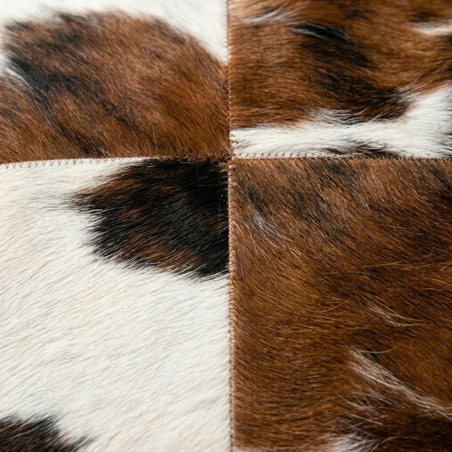 Cowhide Patchwork Pillow Cover | Tricolor Hair-On – 20x20 — close-up of the surface texture